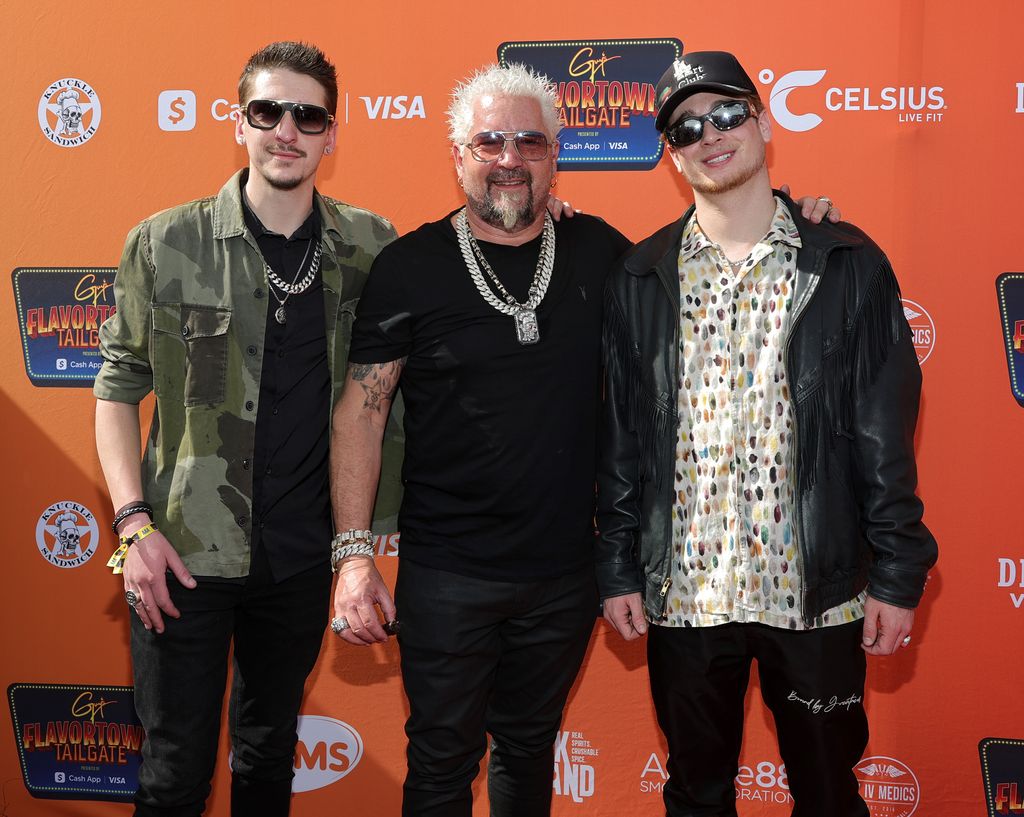 Hunter Fieri, Guy Fieri and Jules Fieri arrive at Guy Fieri's Flavortown Tailgate on February 12, 2023 in Glendale, Arizona.