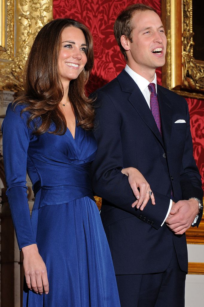 Prince William and Kate Middleton pose for photographers during a photocall to mark their engagement