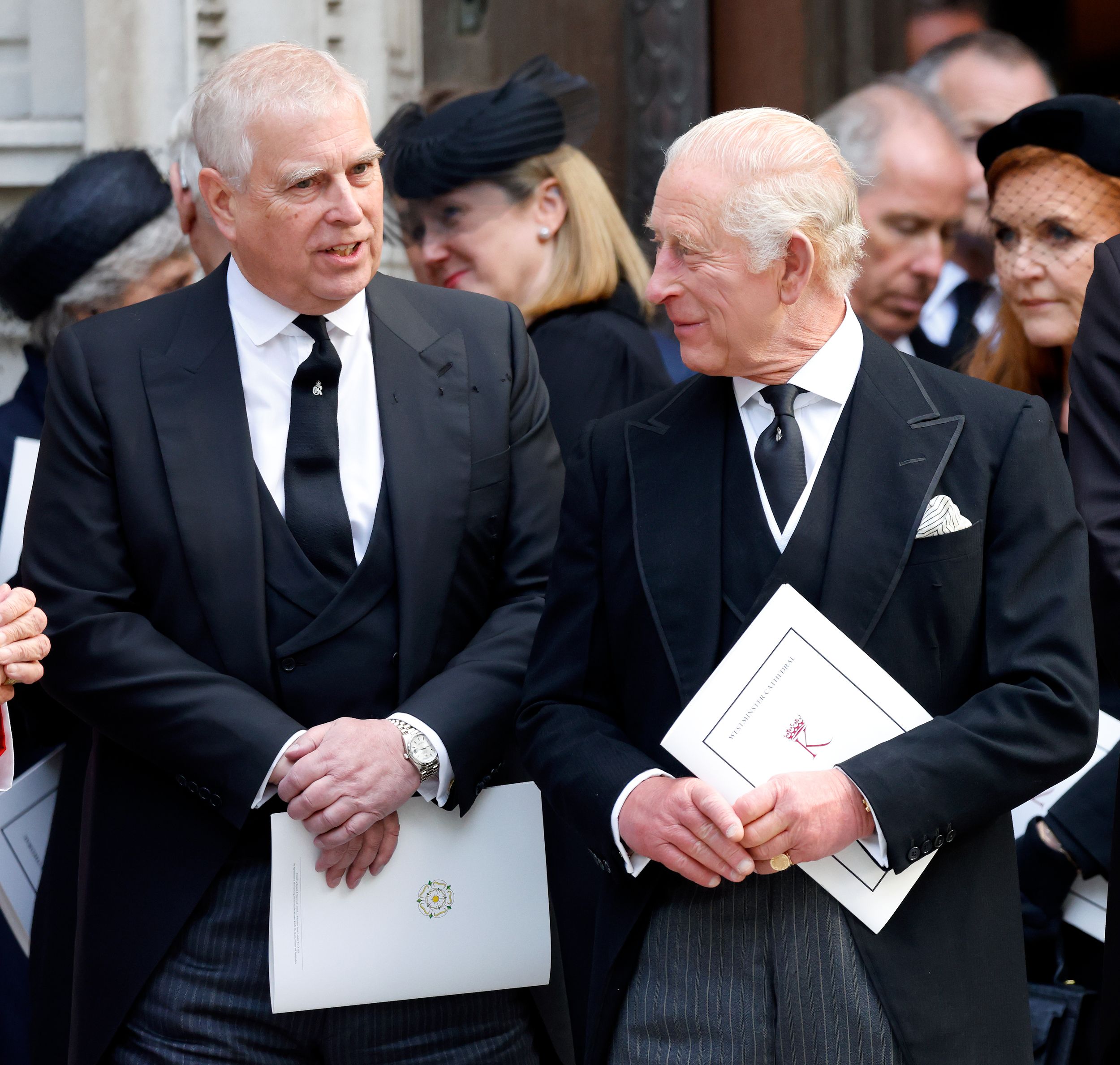 Andrew Mountbatten-Windsor and King Charles at a funeral