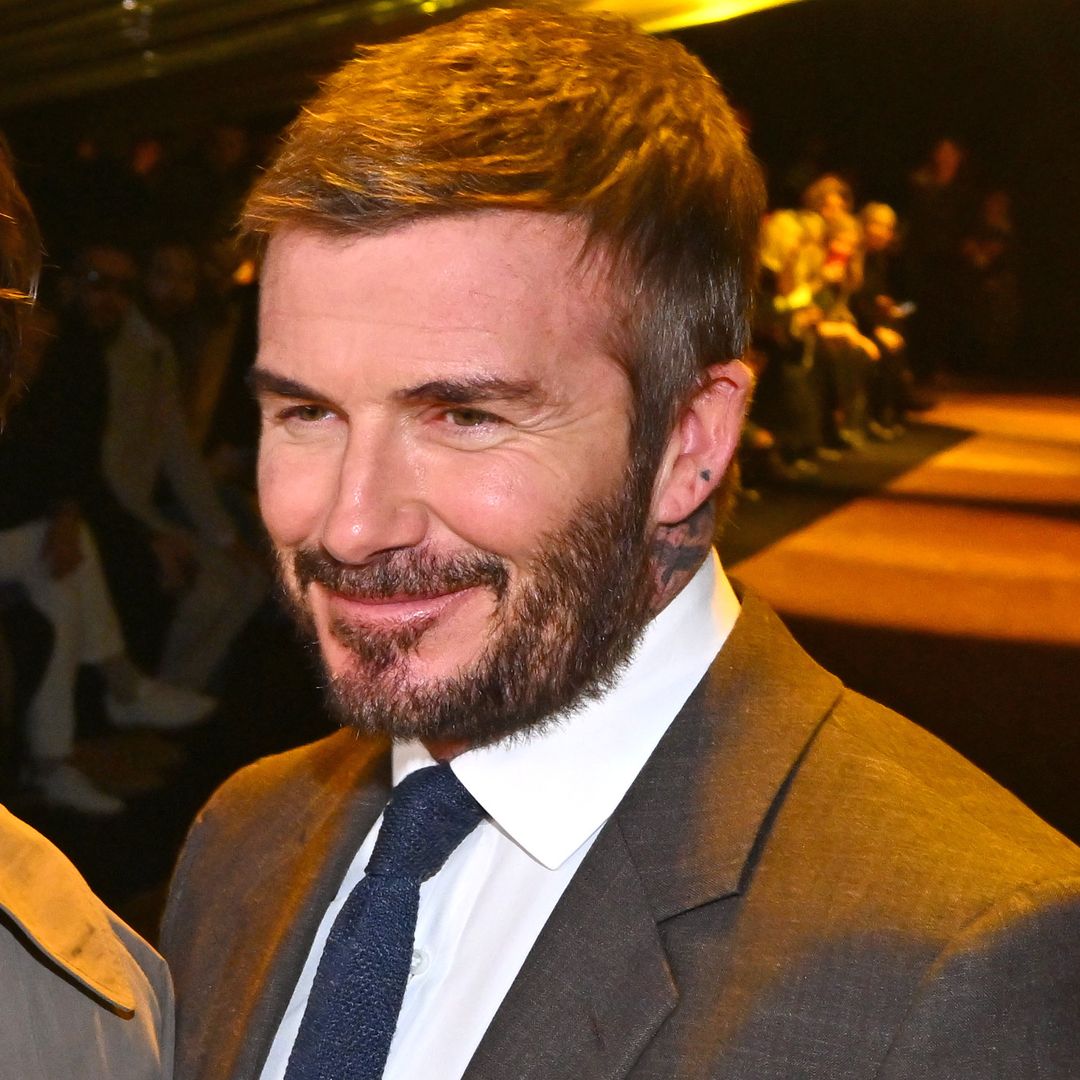 David Beckham in a suit at the Boss fashion show during the Milan Menswear Fall/Winter 2026/2027 Fashion Week