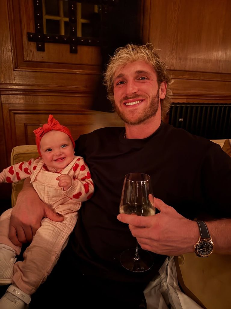 photo of logan paul holding daughter esme
