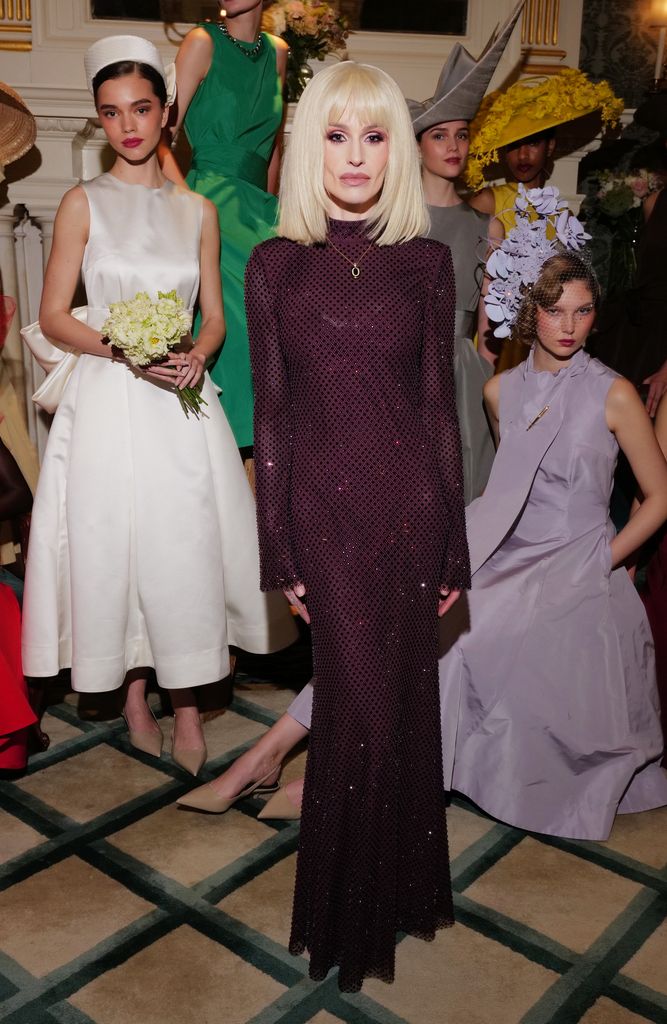 photo of kelly osbourne in long burgundy dress with short blonde hair