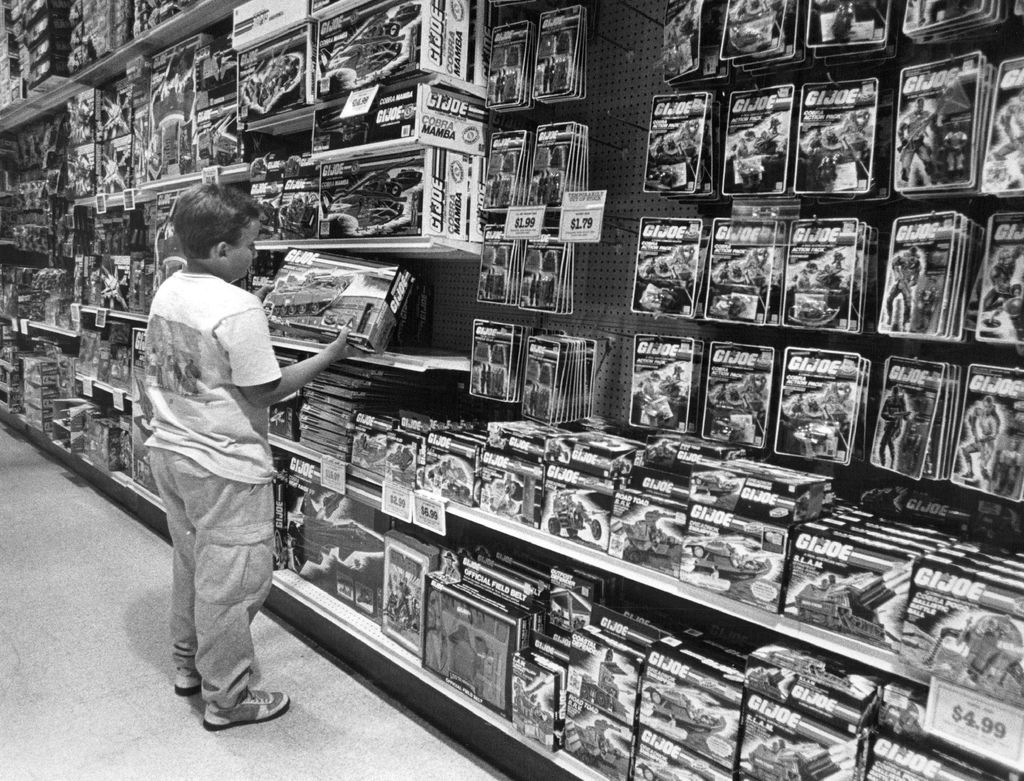 9/24/1987, OCT 4 1987; Childrens palace 5022 S. Jellison kids buying militaristic toys; shot of Sean hill age 10,of Morrison looking at a GI Joe bridge layer Toss'n cross;  (Photo By John Prieto/The Denver Post via Getty Images)