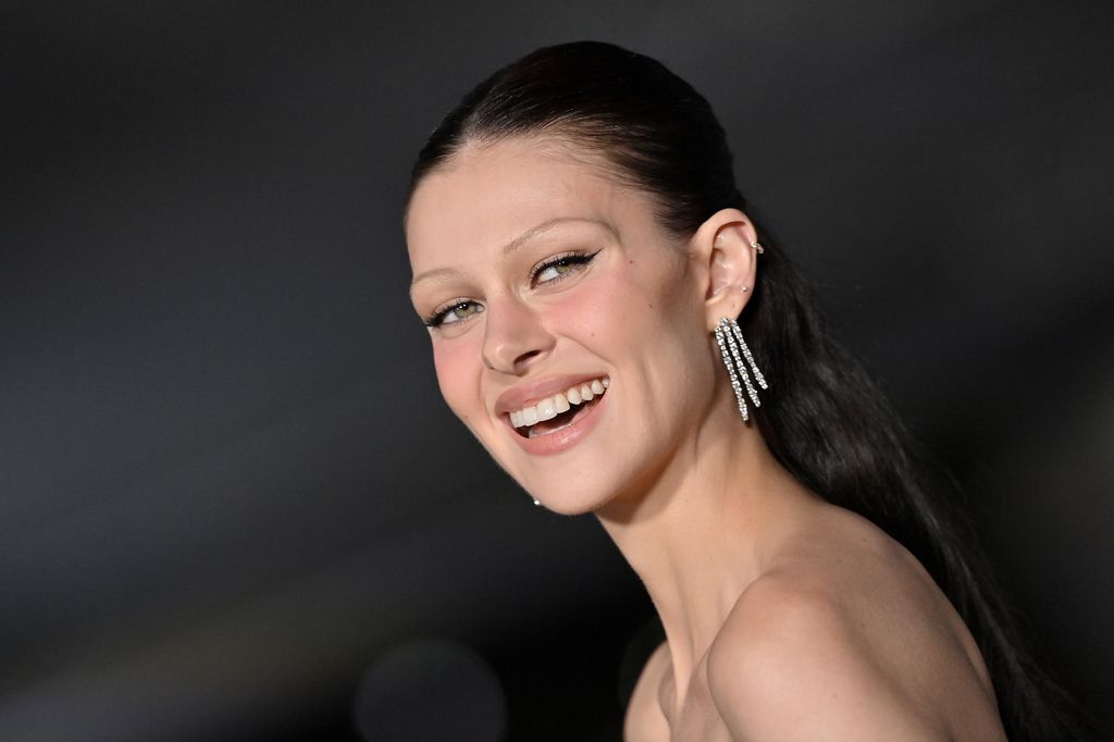 nicola peltz brown hair thin eyebrows 