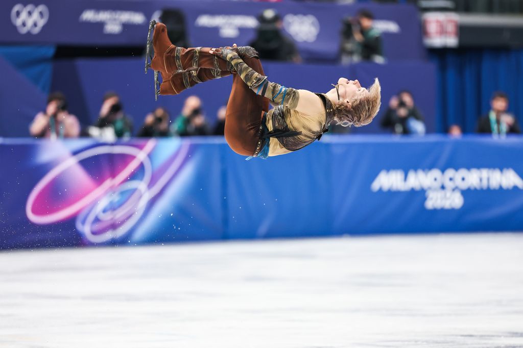 photo of ilia malinin doing backflip on the ice
