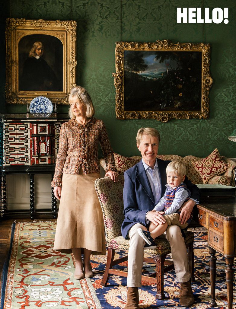 The exquisitely decorated Dutch Room, where James and Lucinda relax with their young grandson, Felix, on James' lap 