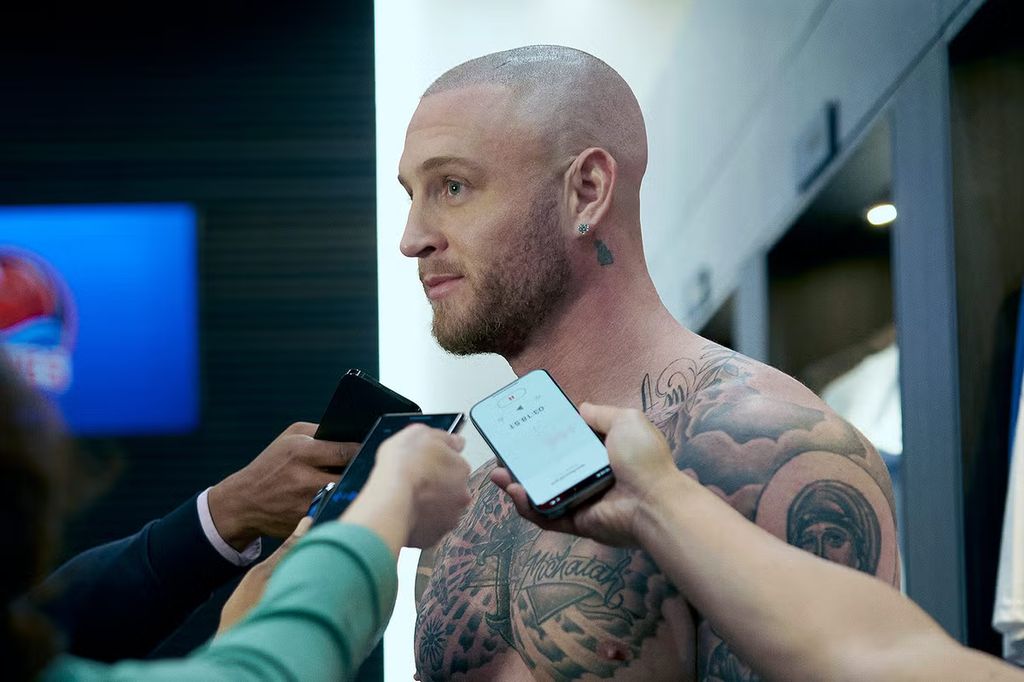 Chet Hanks as Travis Bugg in Running Point