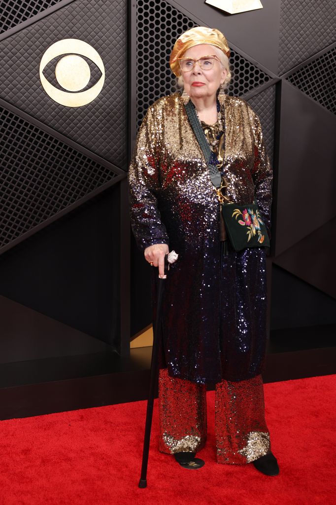 Joni Mitchell arrives on the carpet at the 68th Grammy Awards 