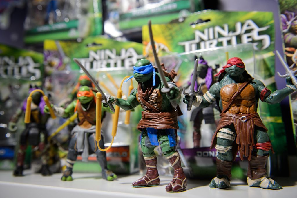Teenage Mutant Ninja Turtle figures are displayed at the DreamToys toy fair in central London, on November 5, 2014. The event sees manufacturers of the predicted Christmas bestsellers showcase their products in the run up to the festive season. AFP PHOTO/LEON NEAL        (Photo credit should read LEON NEAL/AFP via Getty Images)