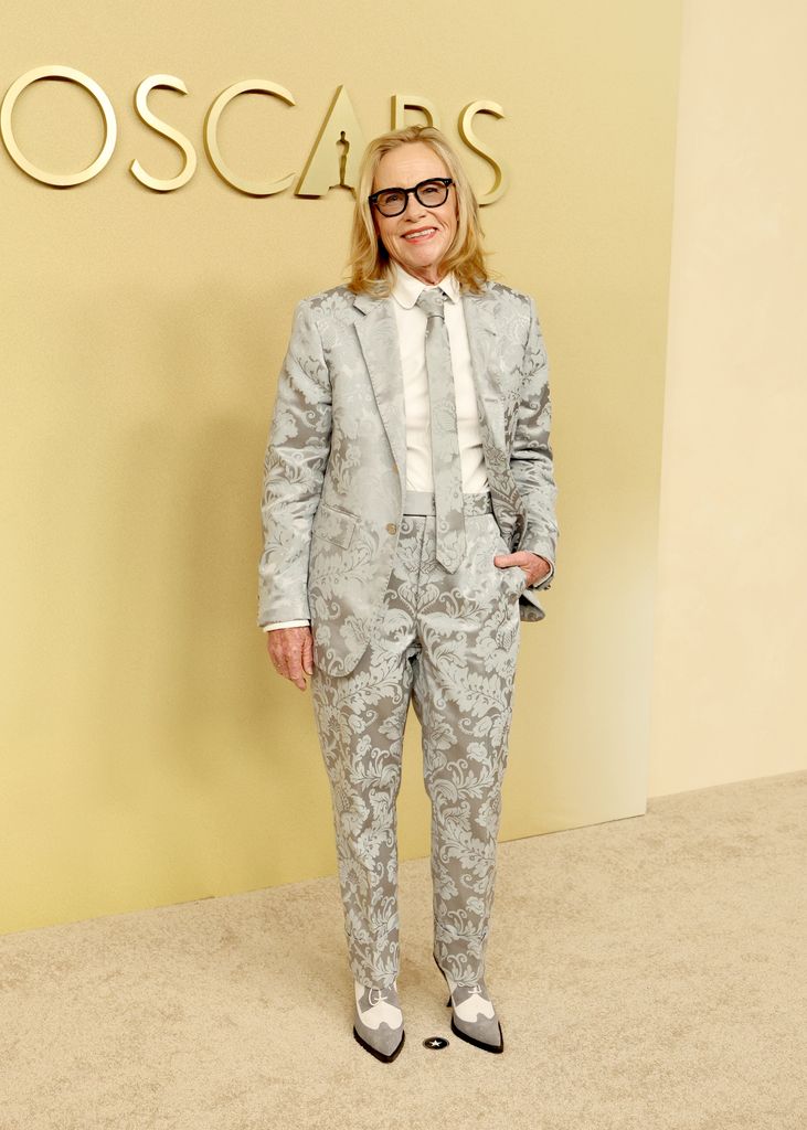 amy madigan floral suit oscars luncheon