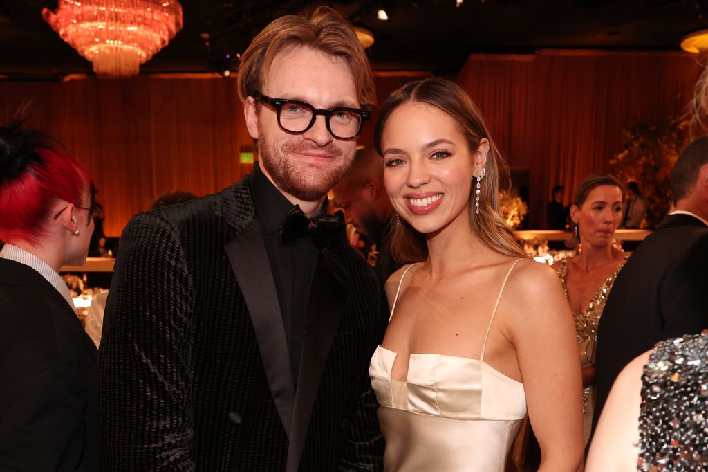FINNEAS and Claudia Sulewski at the 81st Golden Globe Awards held at the Beverly Hilton Hotel on January 7, 2024 in Beverly Hills, California. (Photo by Christopher Polk/Golden Globes 2024/Golden Globes 2024 via Getty Images)