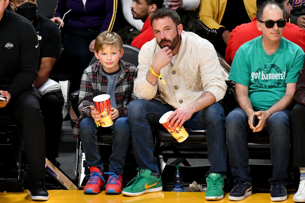 Ben Affleck and his son Samuel Garner Affleck attend a basketball game between the Los Angeles Lakers and the Boston Celtics at Crypto.com Arena on December 13, 2022