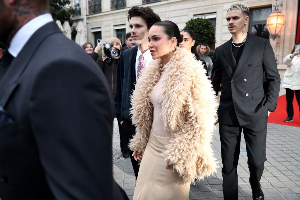 Jackie Apostel, Cruz Beckham, Kim Turnball and Romeo Beckham are seen during Paris Fashion Week