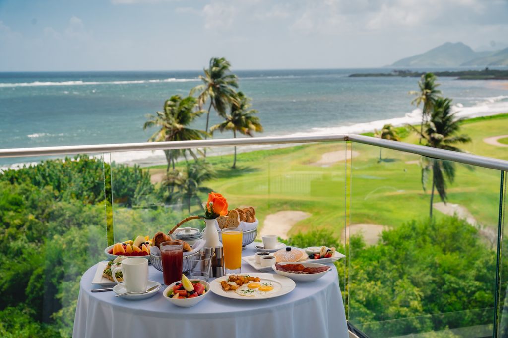 breakfast laid out on hotel balcony table
