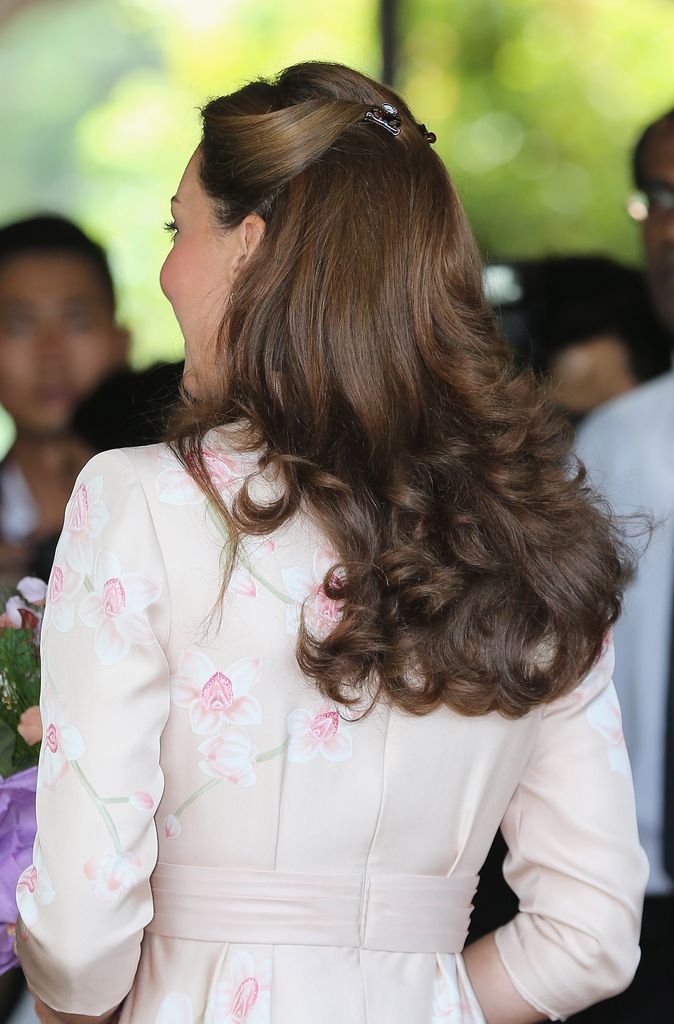 Kate from behind with flicky hair worn down