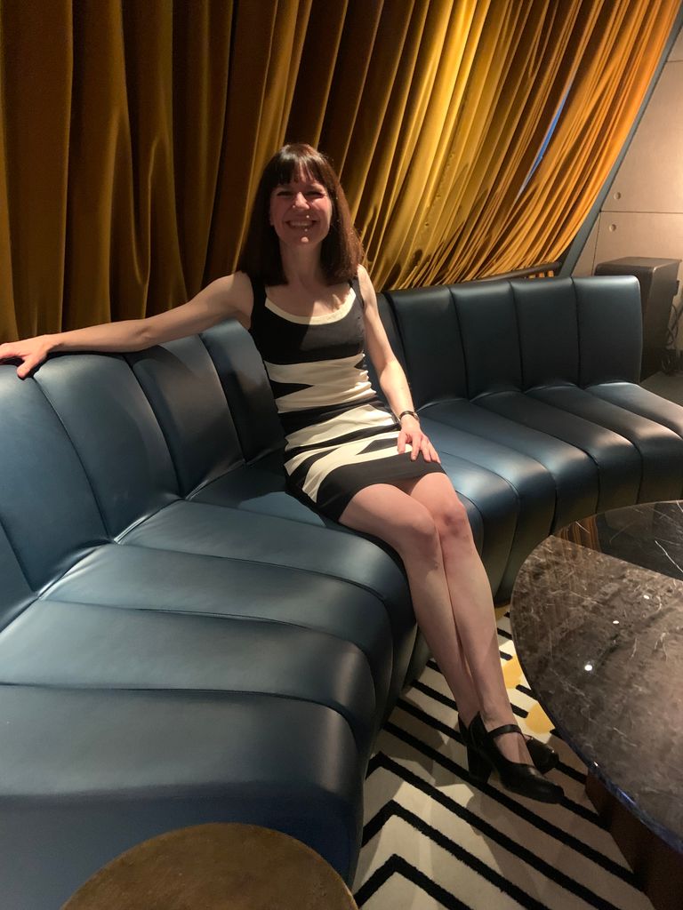 Shot of Ria Hopkinson in living room in apartment at Chateau Denmark hotel, Soho, London