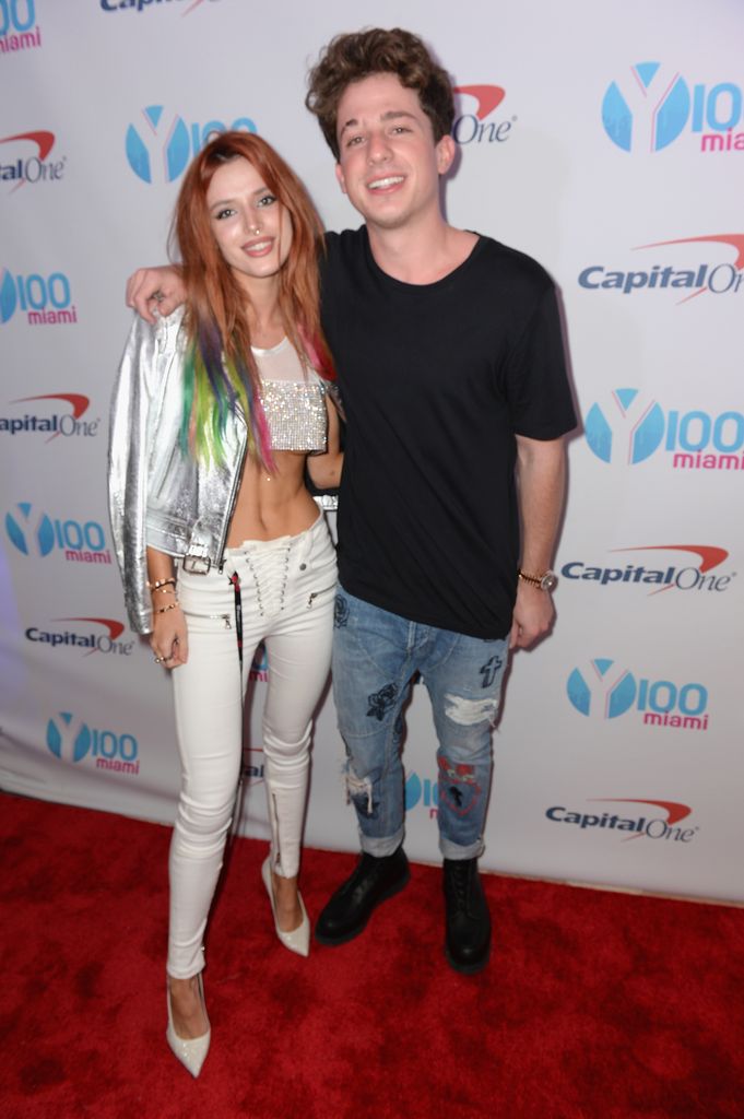 photo of charlie puth with arm around bella thorne