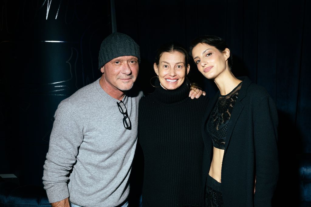 Tim and Faith show their daughter support