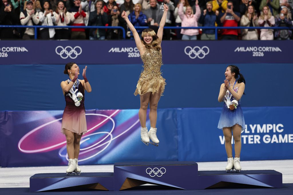 Alysa celebrates on the podium during the medal ceremony for the Women's Single Skating event of the Milano Cortina 2026 Winter Olympic Games
