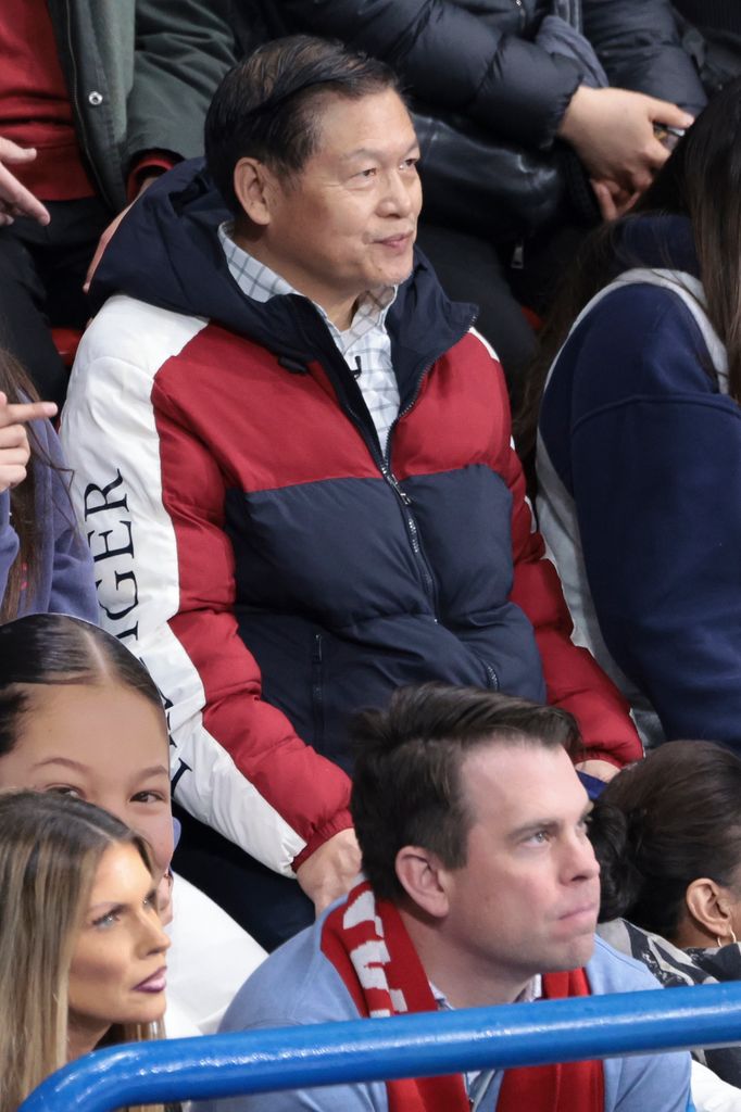 Alysa's father, Arthur watching his daughter win gold