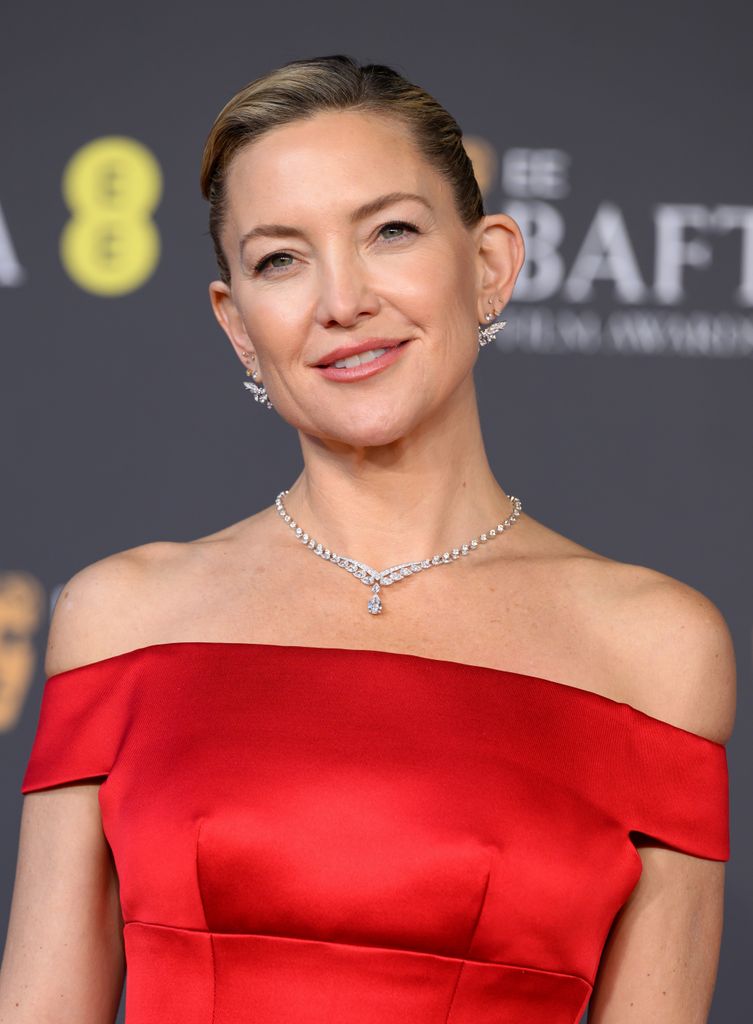 photo of kate hudson in red dress at 2026 baftas