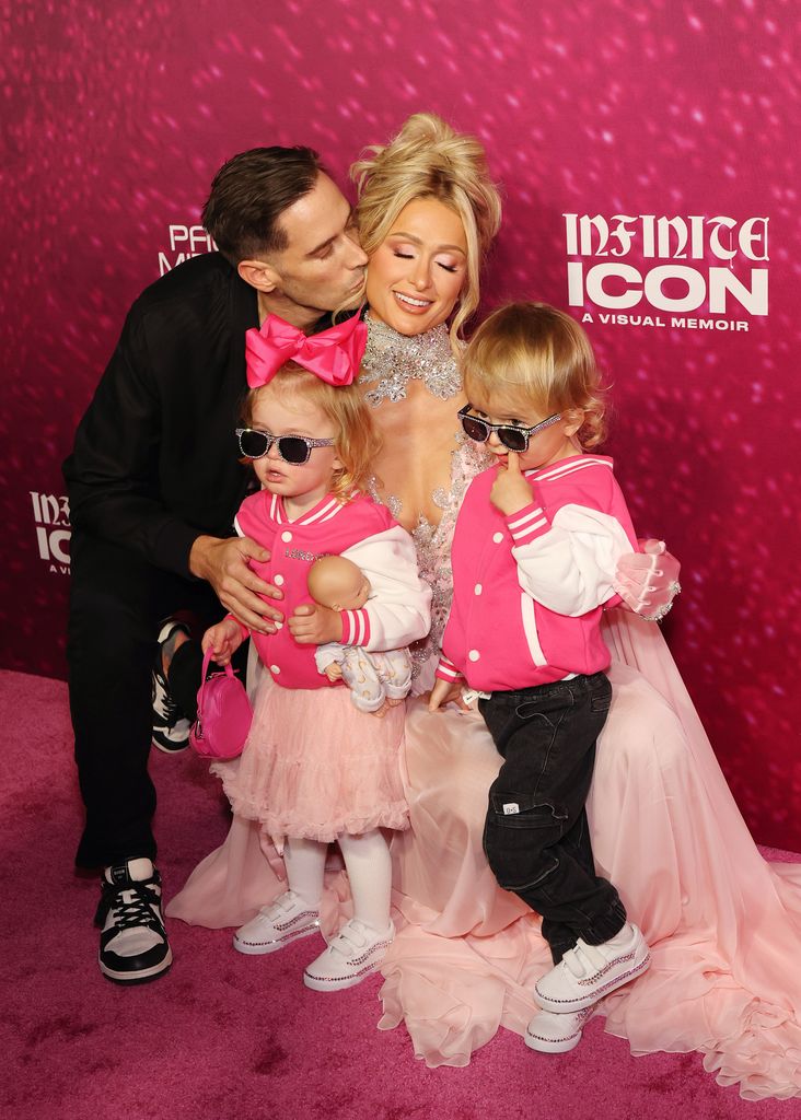 Carter Reum, London Marilyn Hilton Reum, Paris Hilton, and Phoenix Barron Hilton Reum attend the world premiere of "Infinite Icon: A Visual Memoir" at AMC The Grove 14 on January 20, 2026 