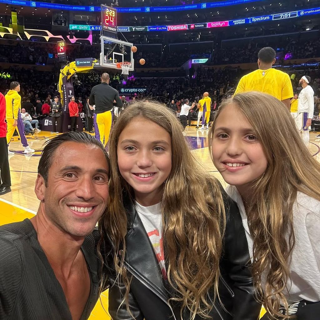 Martin Blencowe and his twin daughters