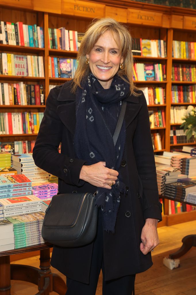 Santa Montefiore standing inside a bookshop