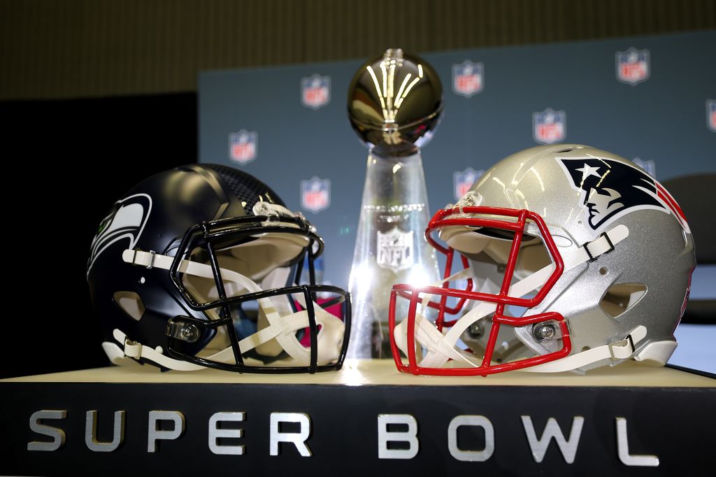 photo of seattle seahawks helmet and new england patriots helmet