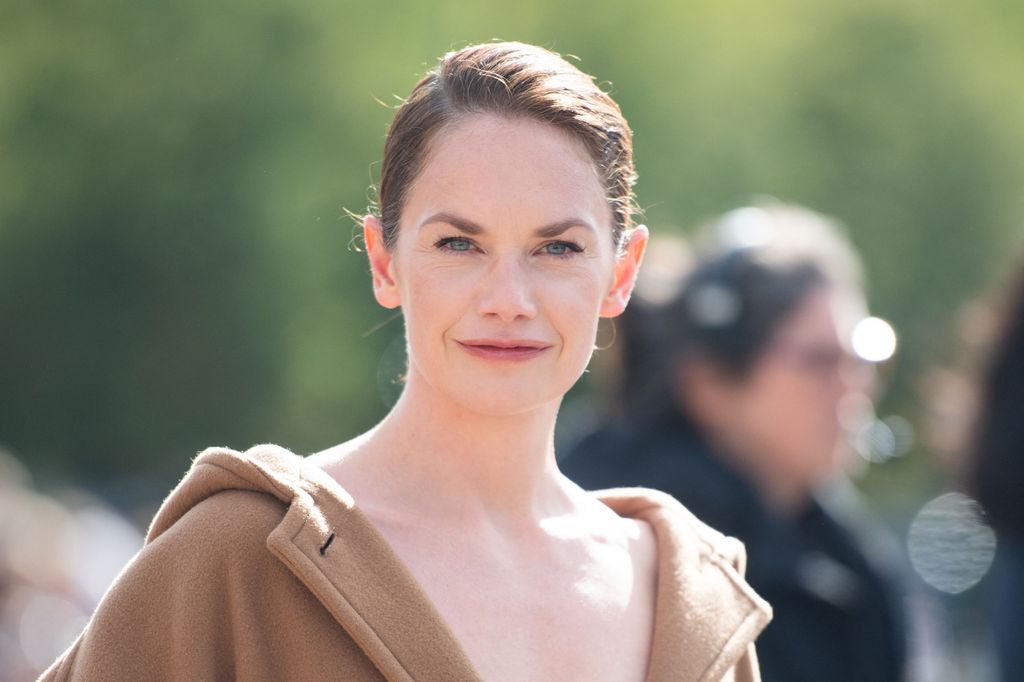 brunette woman smiling for photo