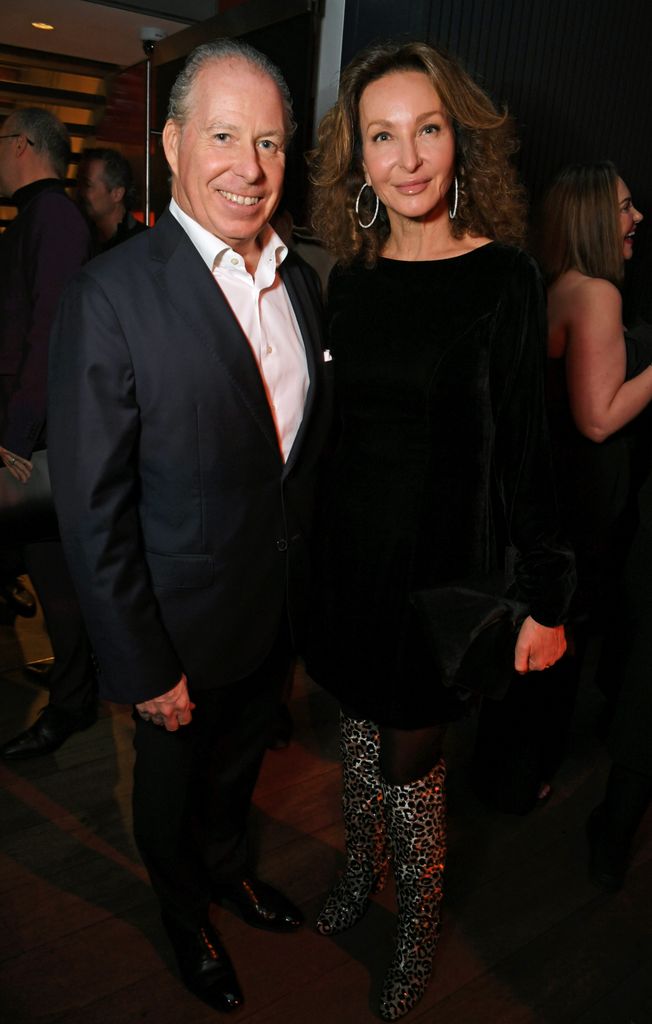 David Armstrong-Jones beside Isabelle Chopin De La Bruyere in dark room 