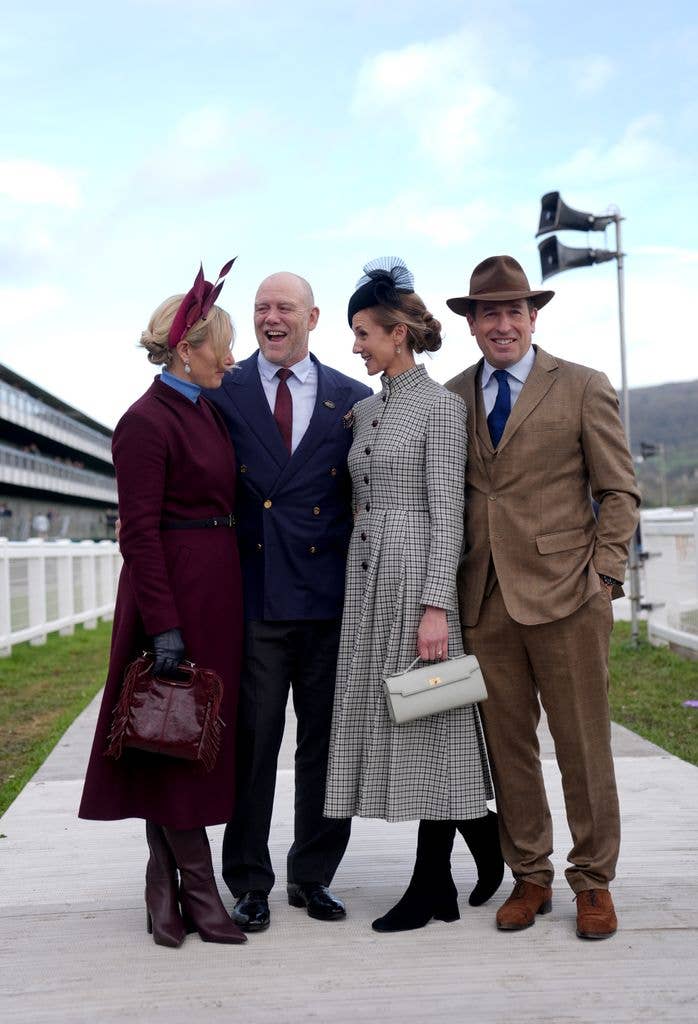 Zara Tindall, Mike Tindall, Harriet Sperling and Peter Phillips sharing a laugh at Cheltenham