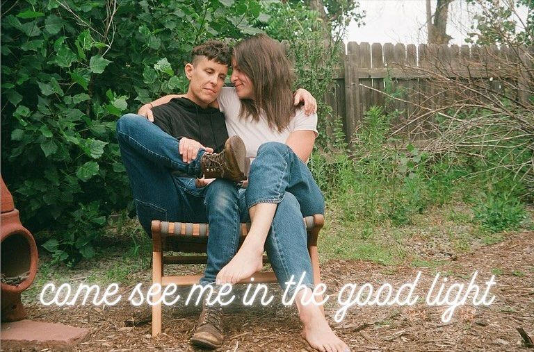 Andrea and Megan hugging ona bench