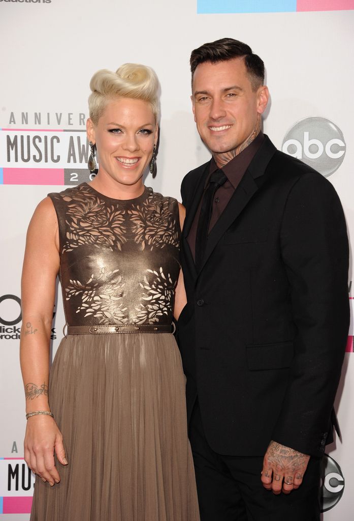 Singer Pink and athlete Carey Hart attend the 40th American Music Awards held at Nokia Theatre L.A. Live on November 18, 2012 in Los Angeles, California.
