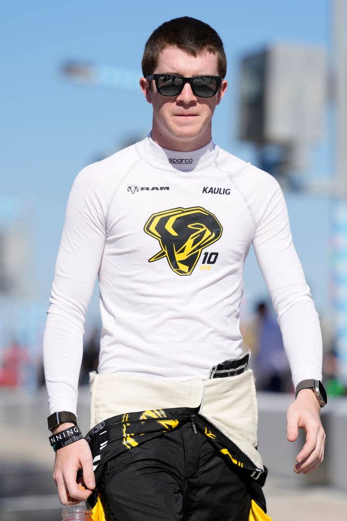 Daniel Dye, driver of the #10 Mopar RAM, walks the grid during qualifying for the NASCAR Craftsman Truck Series Fresh from Florida 250 at Daytona International Speedway on February 13, 2026 in Daytona Beach, Florida.