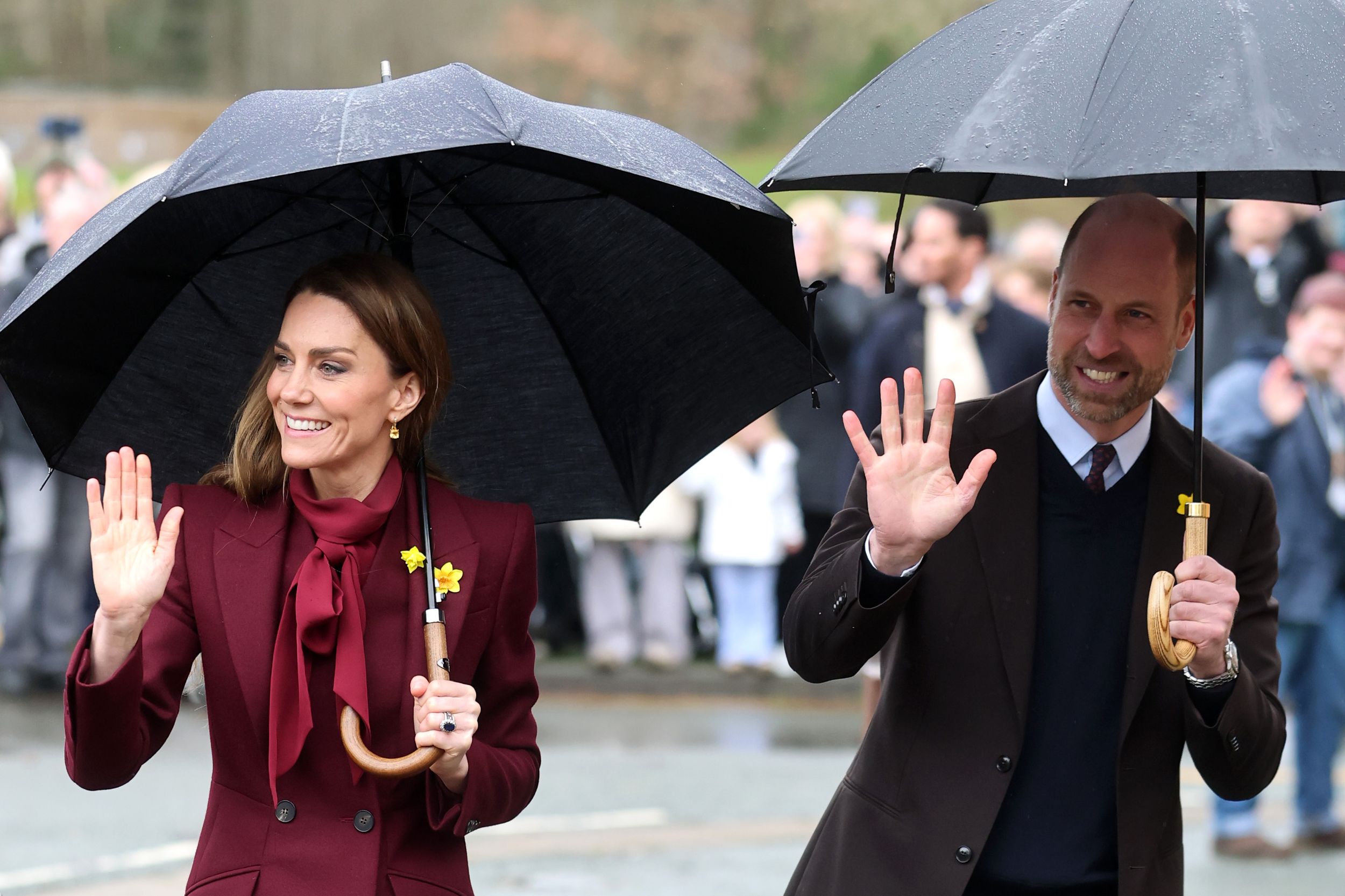 Catherine, Princess of Wales and William, Prince of Wales waves to well wishers as they arrive for their visit to the Oriel Davies on February 26, 2026 in Newtown, Wales. The Prince and Princess of Wales visited communities in Powys, Wales today ahead of St David's Day
