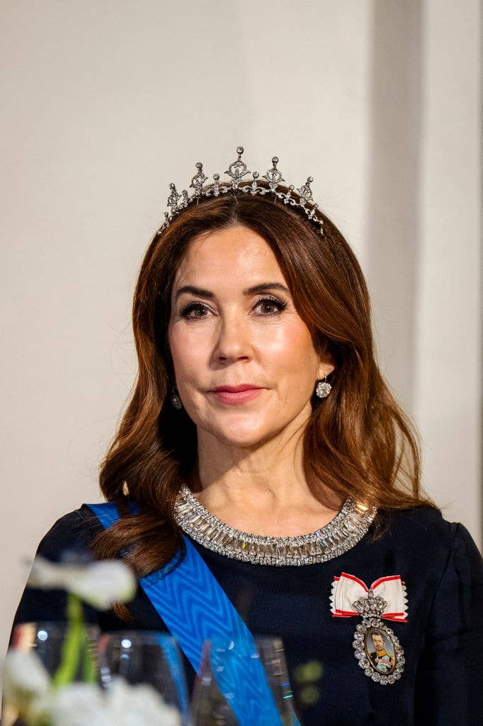 Queen Mary head on in navy dress and tiara