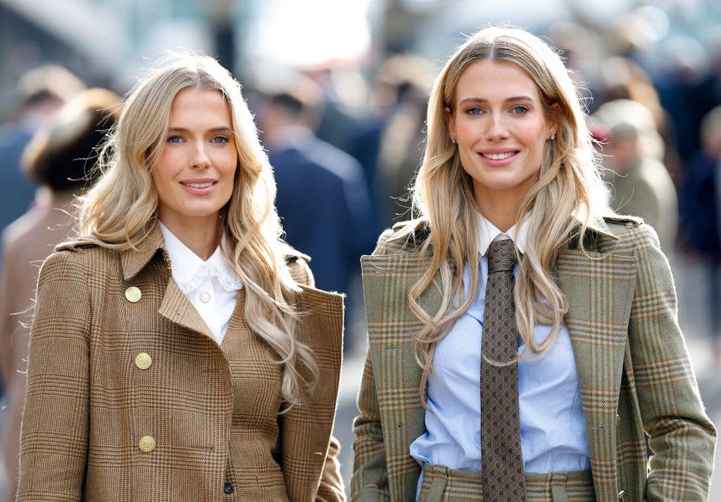 Lady Eliza Spencer and Lady Amelia Spencer in coordinating tweed suits waist up