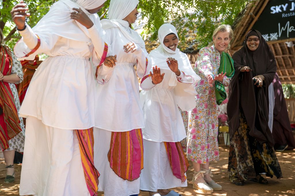 The Duchess of Edinburgh joins in a traditional dance in Wajir, north-east Kenya, on day two of her visit to Kenya.