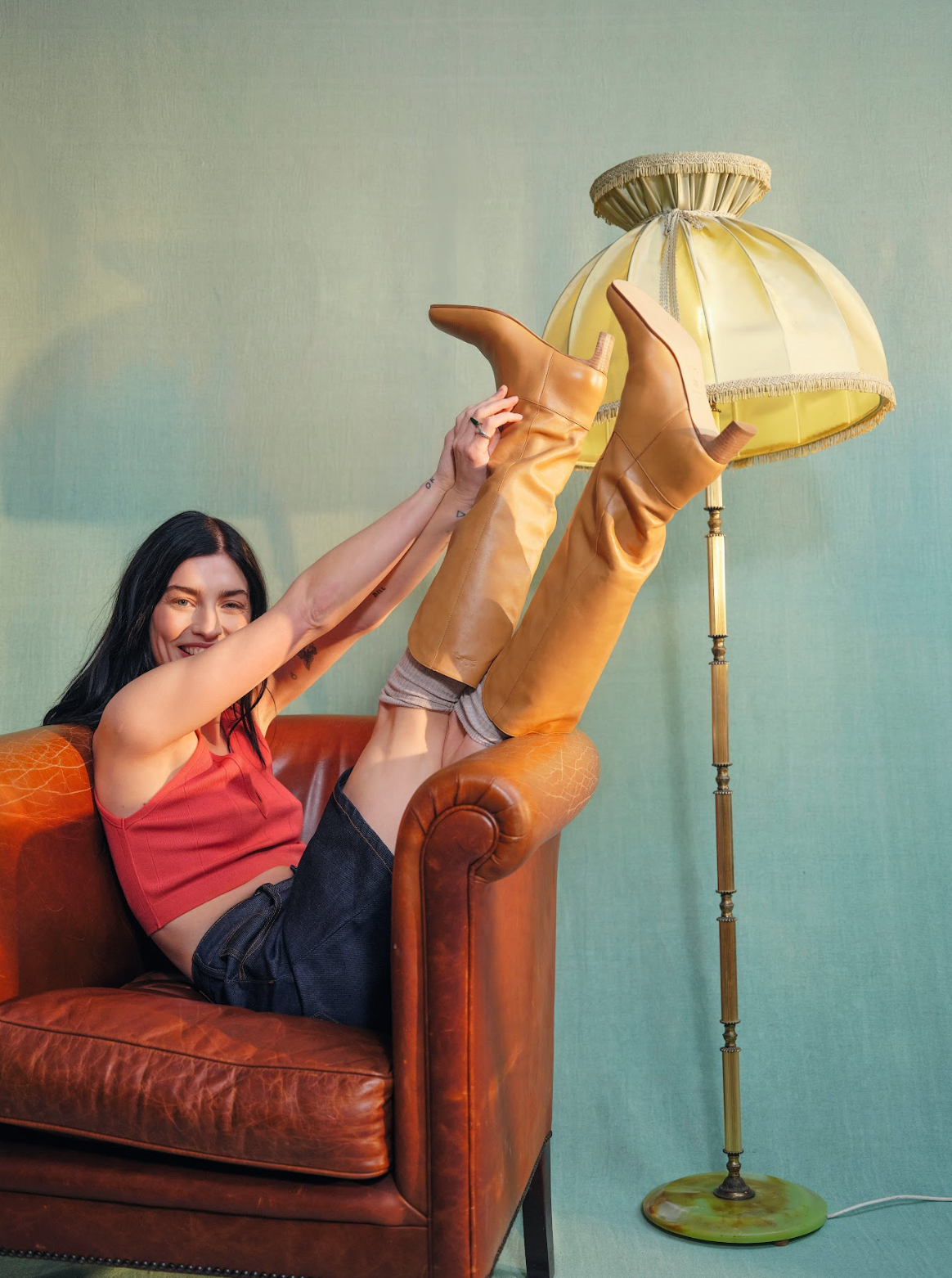 sydney lima in yellow boots