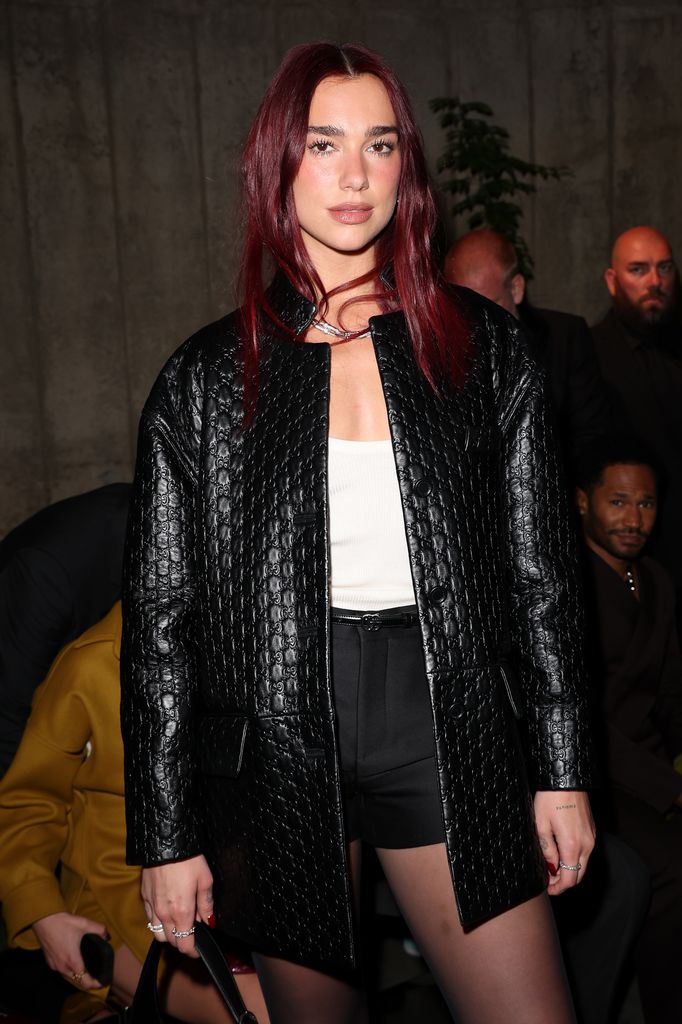 Dua Lipa opted for a darker cherry red shade