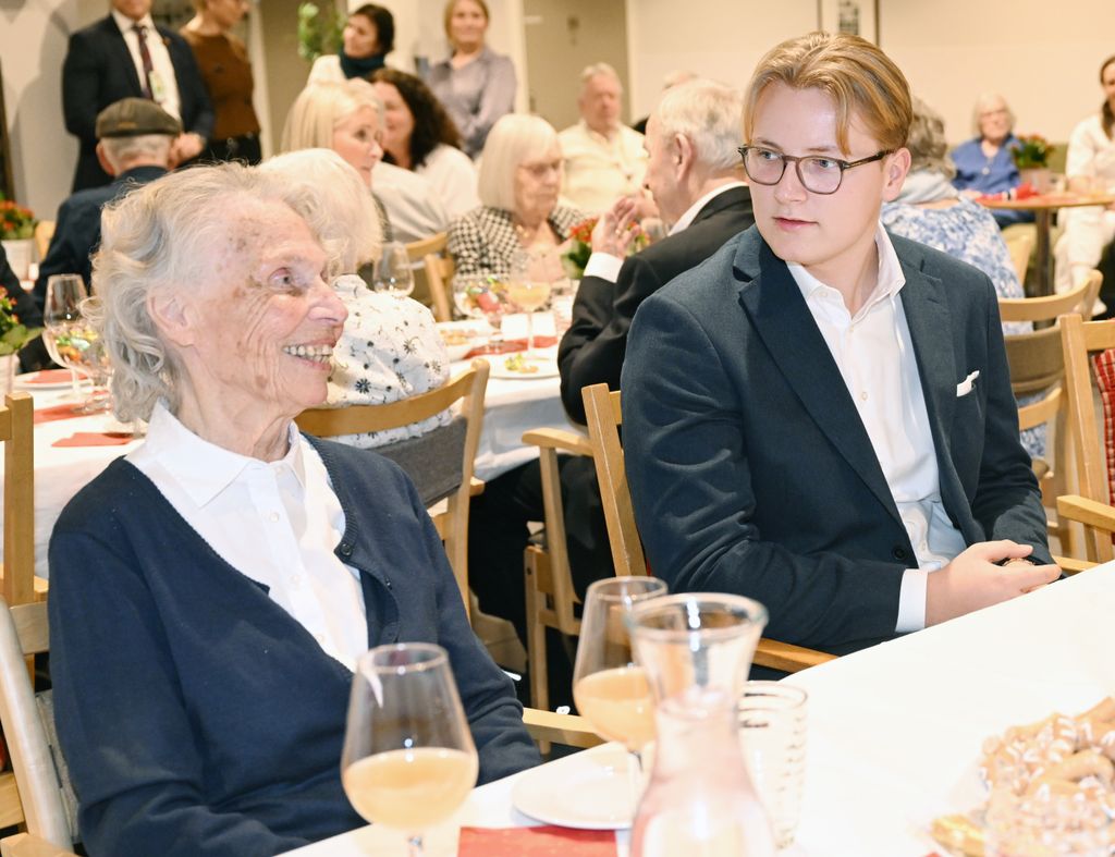 Norwegian Prince Sverre Magnus visits a nursing home with Crown Princess Mette-Marit.
