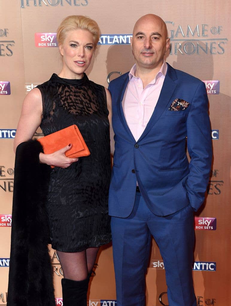 Hannah Waddingham in a black dress with Gianluca Cugnetto in a blue suit