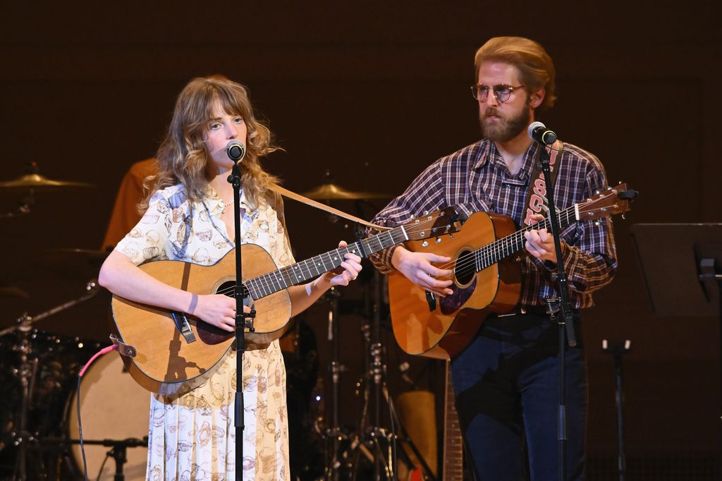 Maya Hawke and Christian Lee Hutson perform onstage during the 37th Annual Tibet House US Benefit Concert