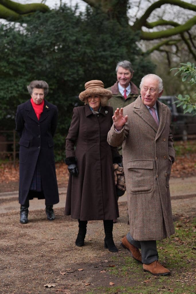 king Charles III, Queen Camilla, the Princess Royal and her husband Vice Admiral Sir Tim Laurence, outside in coats