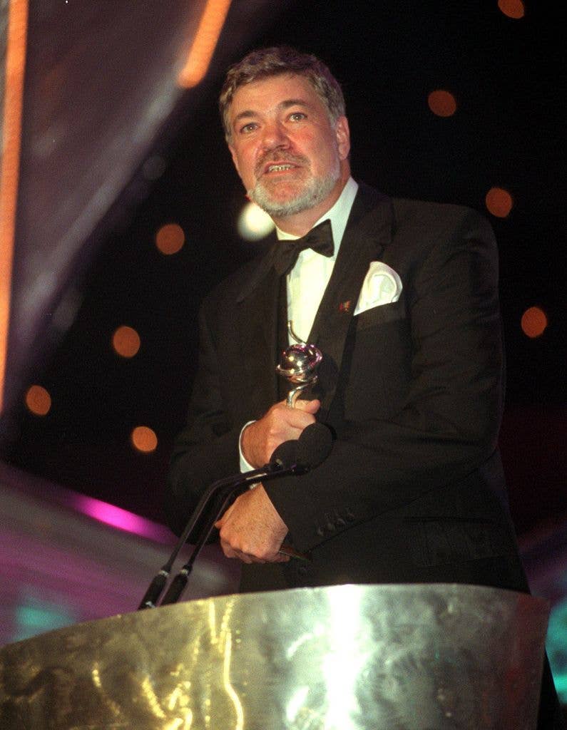 Television presenter Matthew Kelly collects the award for Most Popular Entertainment Programme, for the show 'Stars In Their Eyes