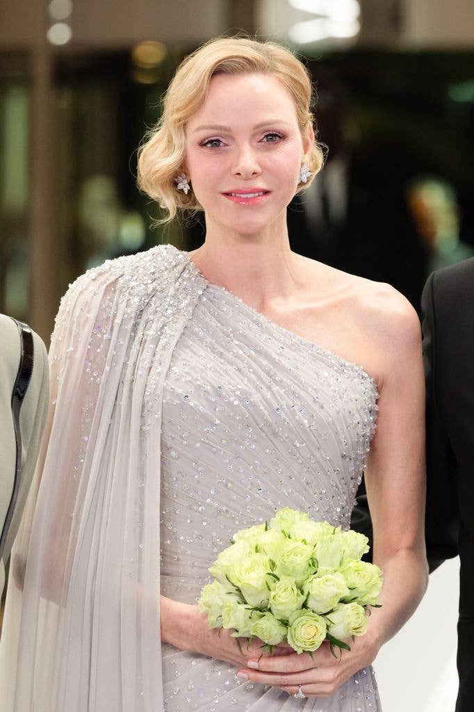 Princess Charlene waist up in silver dress