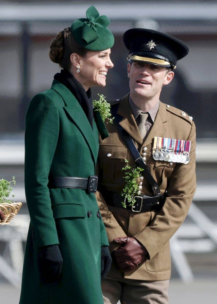 Kate Middleton laughing while watching a parade