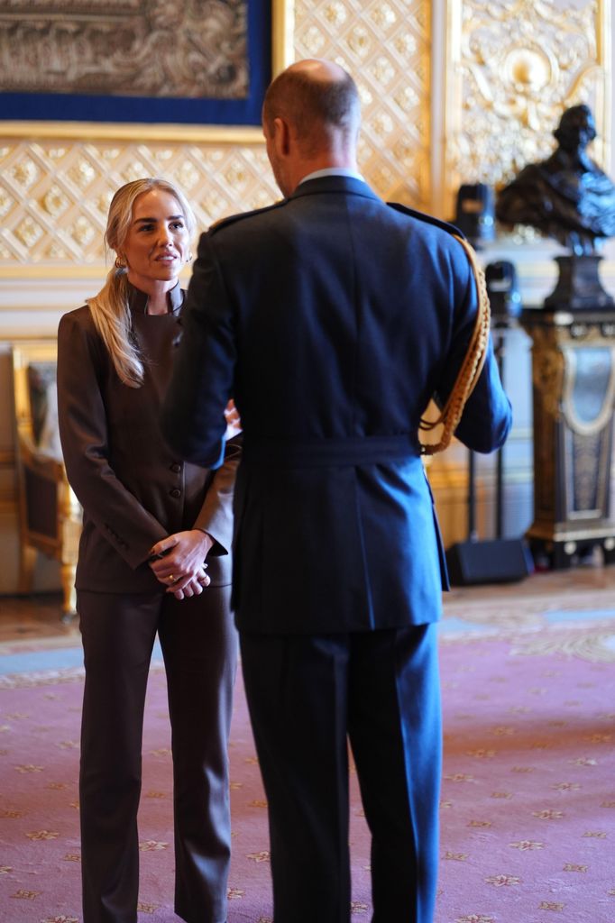 Alex Greenwood is made a Member of the Order of the British Empire by the Prince of Wales