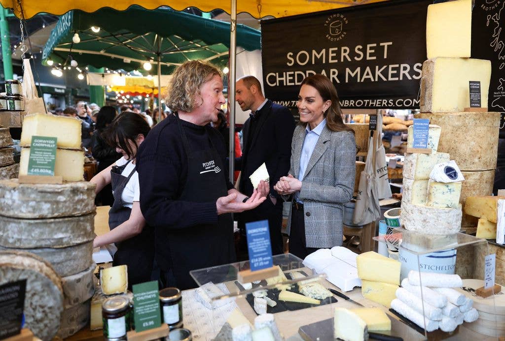 The Prince and Princess at cheesemakers stand 
